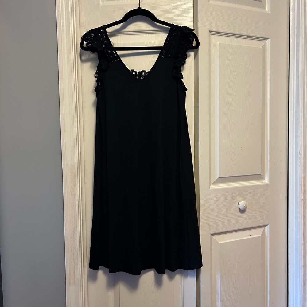 Black dress with cute lace detail on the sleeves and back